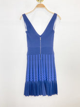 Load image into Gallery viewer, Sleeveless Knit Dress with Pleated Skirt
