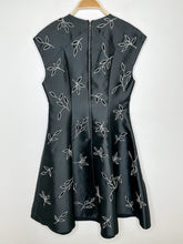 Load image into Gallery viewer, Taffeta Fit + Flare Cap Sleeve Midi Dress with Floral Cutouts
