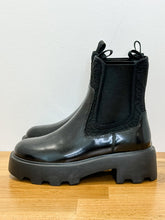 Load image into Gallery viewer, T Monogram Lug Sole Chelsea Boots (orig. $500)
