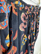 Load image into Gallery viewer, Snake Print Tapered Leg Pull On Pants with Beaded Tassles
