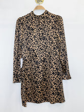 Load image into Gallery viewer, Samuel Silk Animal Print Long Sleeve Mock Neck Mini Dress
